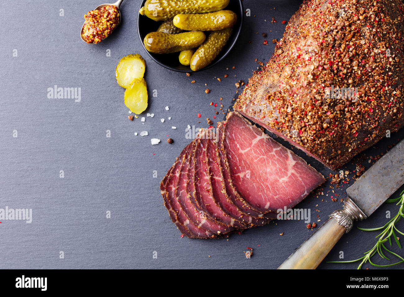 Roasted beef, pastrami on slate board. Top view Stock Photo Alamy