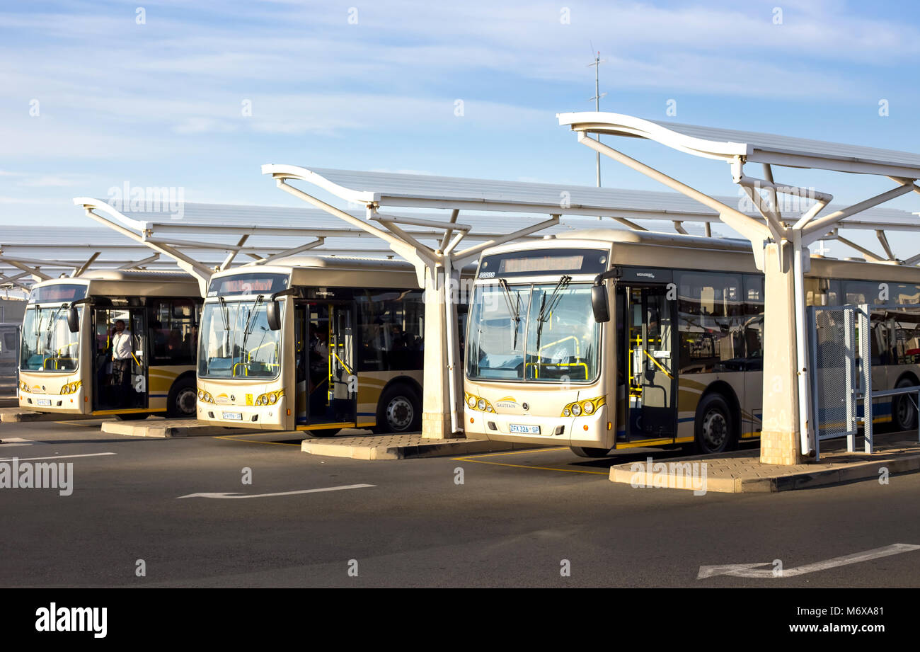 Pretoria, South Africa - March 6, 2018: Public busses waiting in depot. Stock Photo