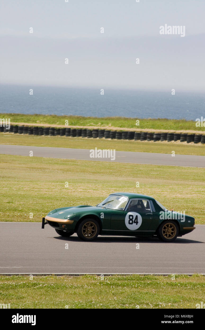 Green Lotus Elan speeding around the Anglesey motor racing circuit, Ty Croes, Anglesey, Wales, June Stock Photo