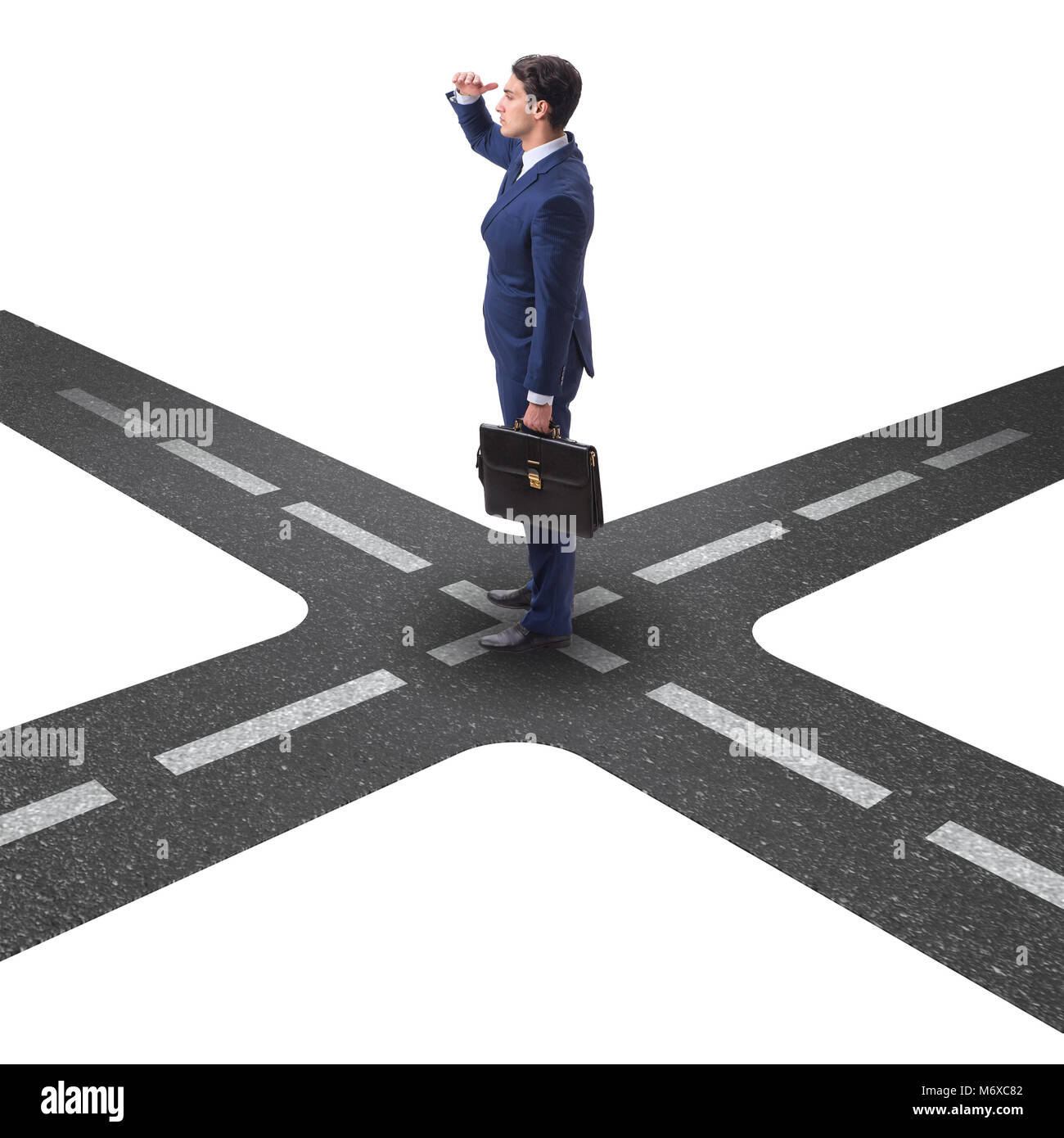Young Businessman At Crossroads In Uncertainty Concept Stock Photo Alamy