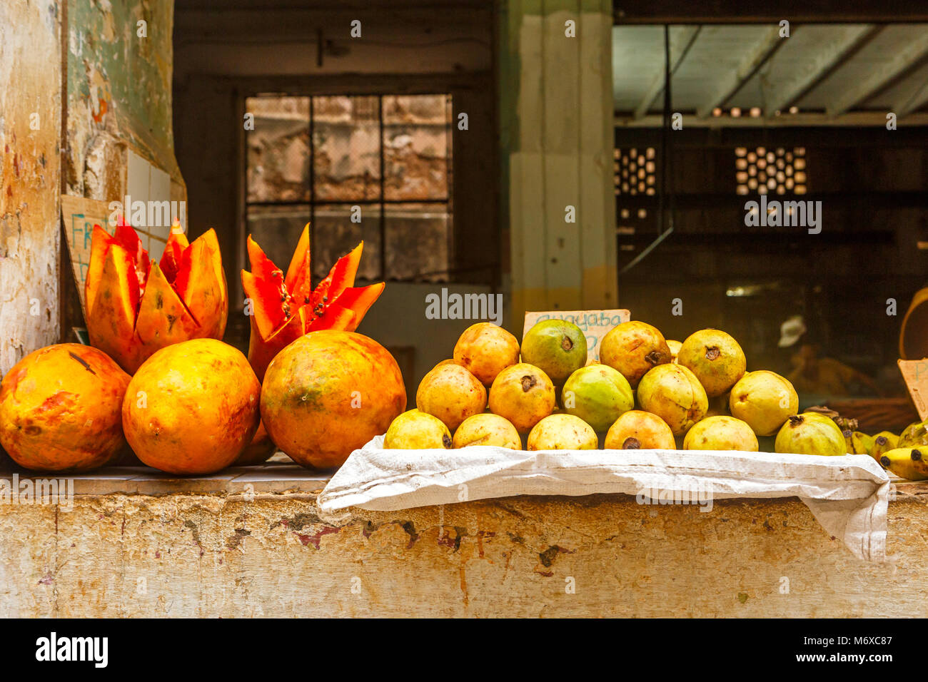 Guavas and Papaya at a Produce Stand in Havana Cuba Stock Photo