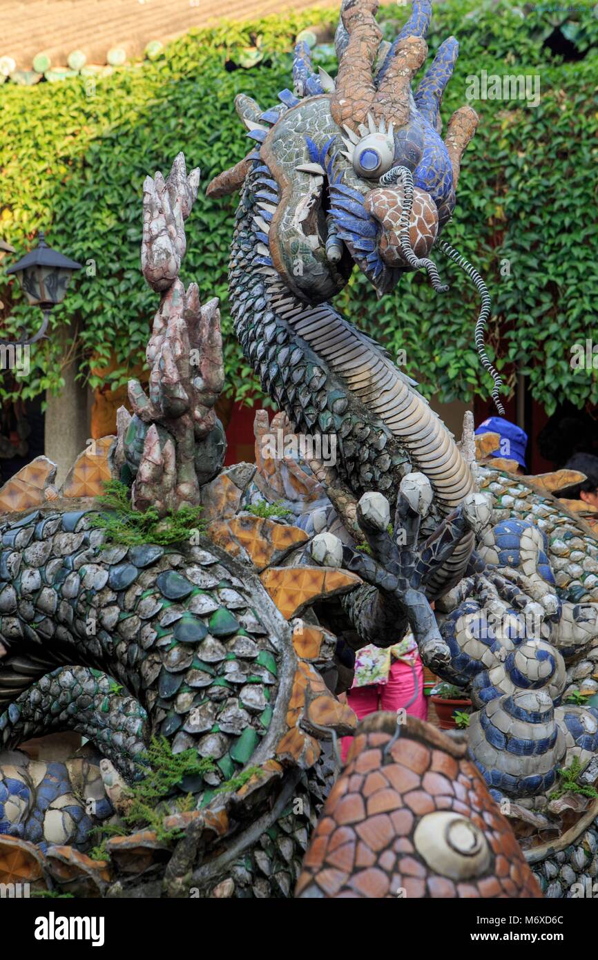 A giant dragon sculpture in the courtyard of the Cantonese Assembly Hall, Hoi An, Vietnam Stock Photo