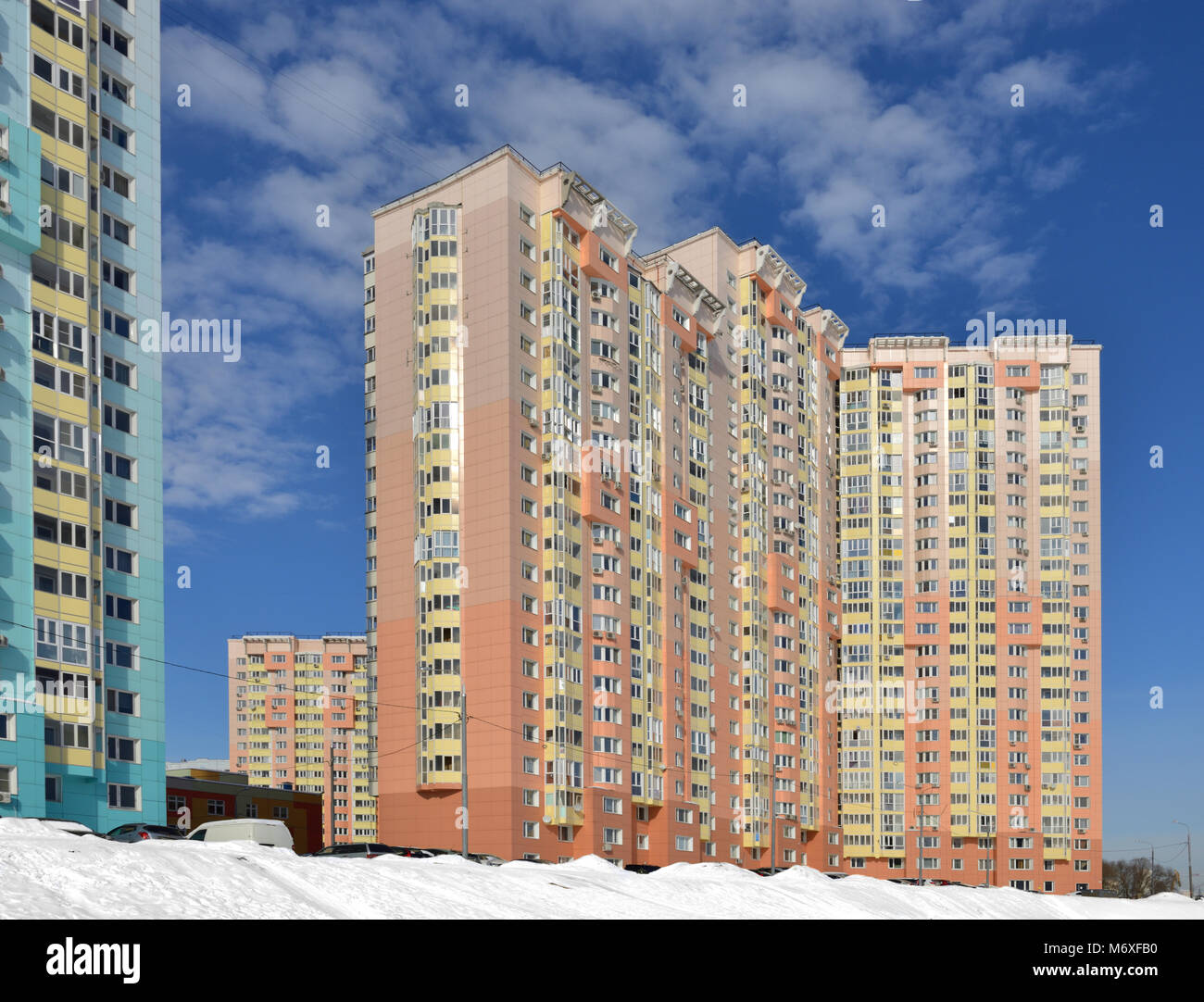 New buildings against blue sky with clouds in winter Stock Photo - Alamy