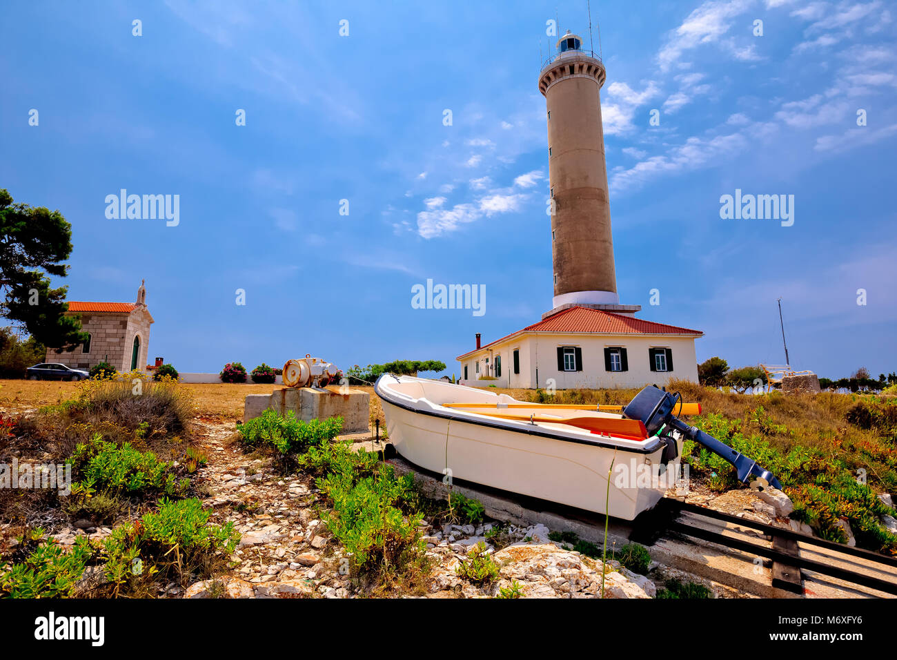 Veli Rat lighthouse and boat extraction tracks, Dugi Otok island, Dalmatia, Croatia Stock Photo