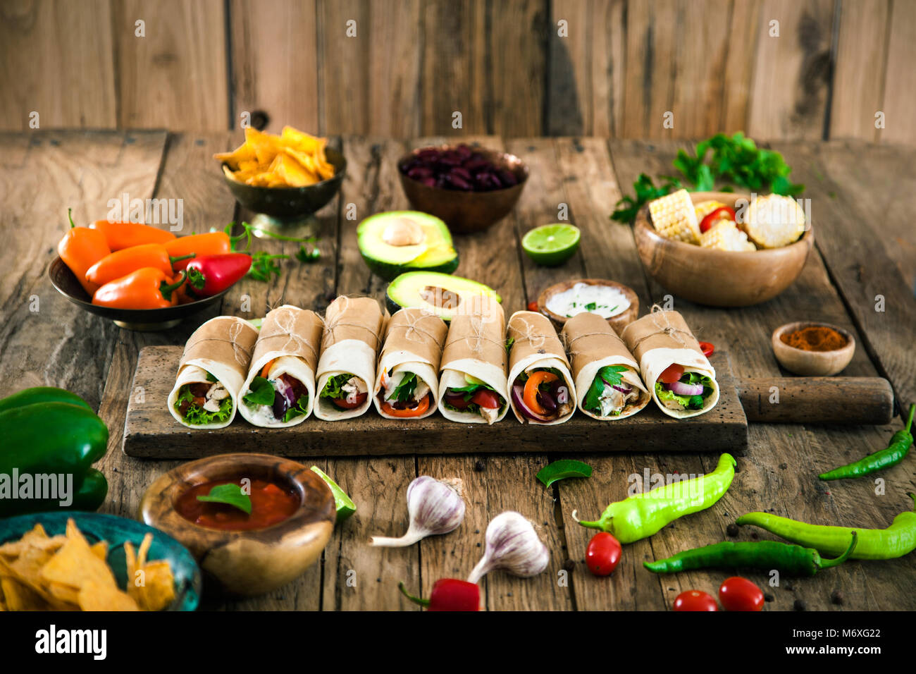 Tortilla wraps with vegetables. Mexican tortillas. Tacos with nachos and  vegetables Stock Photo - Alamy