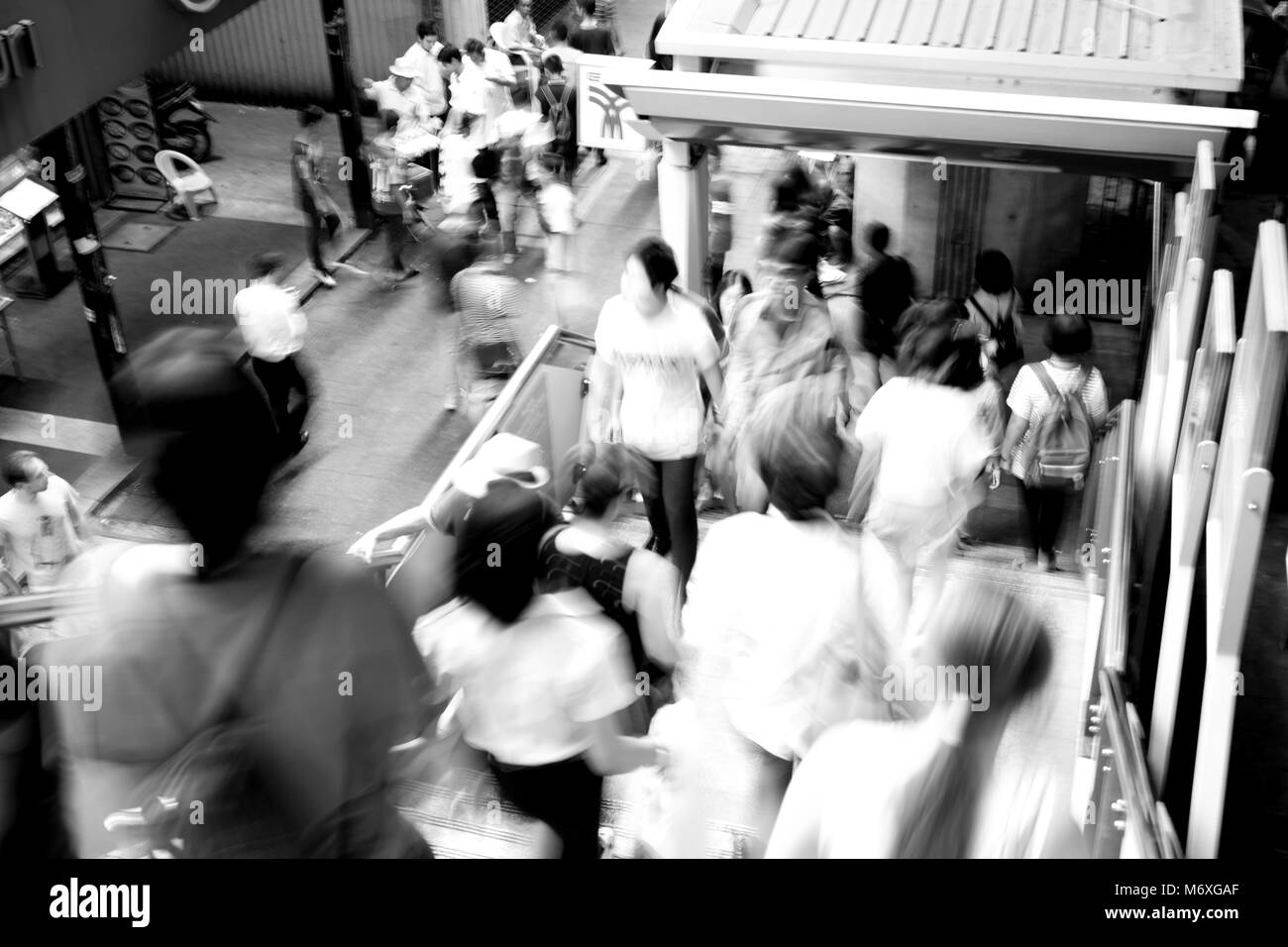 Moving blur people walking - black and white effect Stock Photo - Alamy