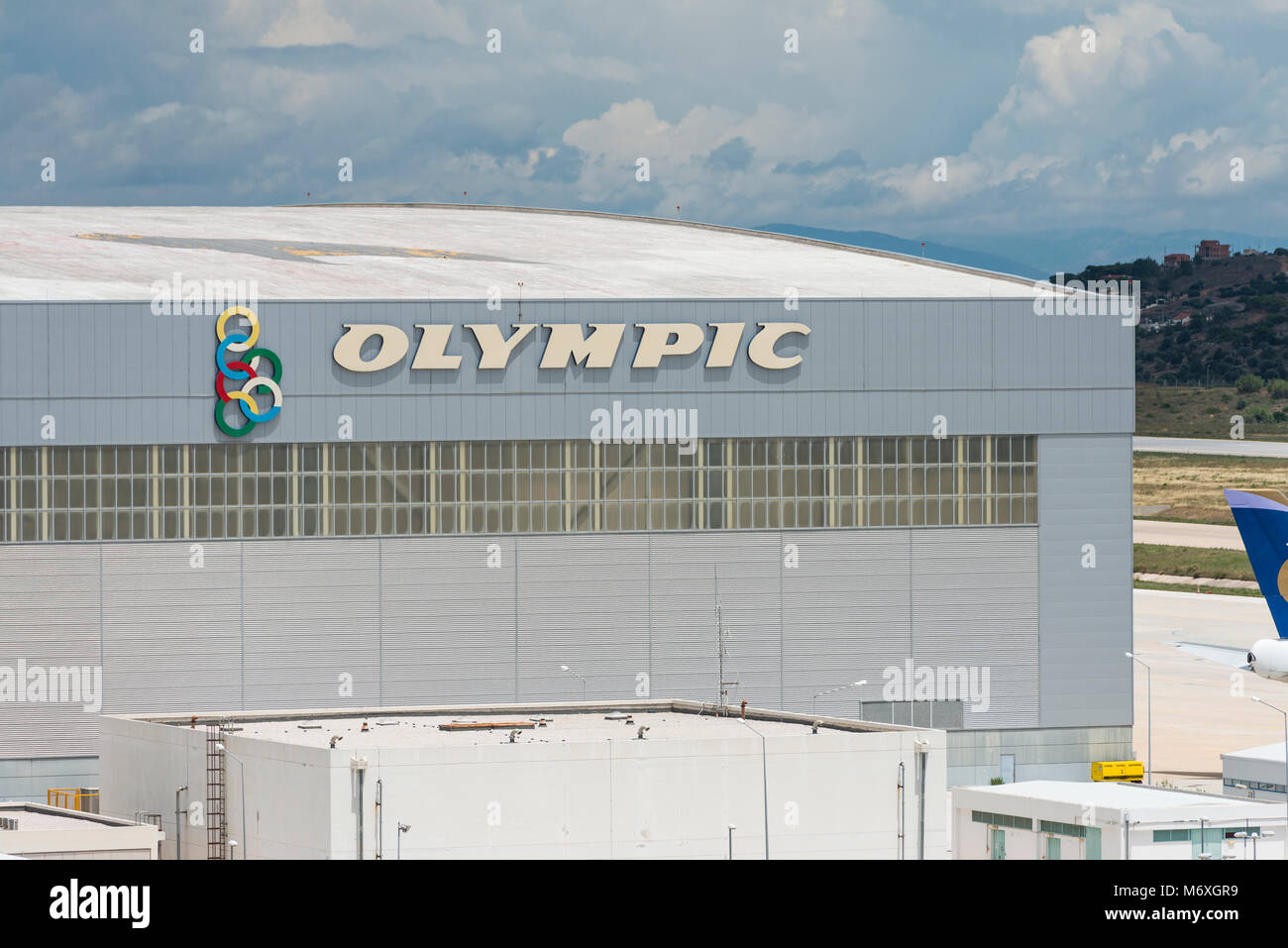 Olympic Airways logo and brand on their hangar at Athens International Airport Stock Photo