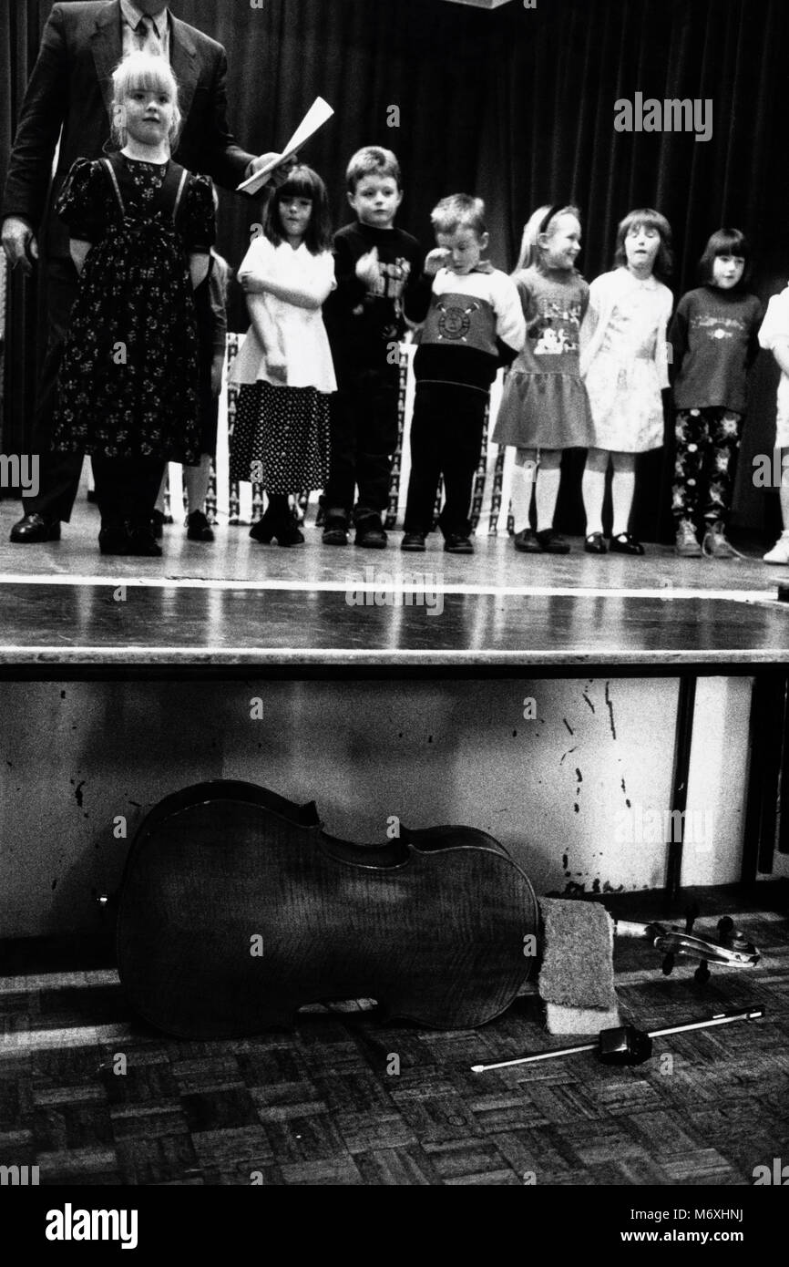 Young children on stage at small eisteddfod in village hall at Y Groeslon Gwynedd North Wales UK Stock Photo