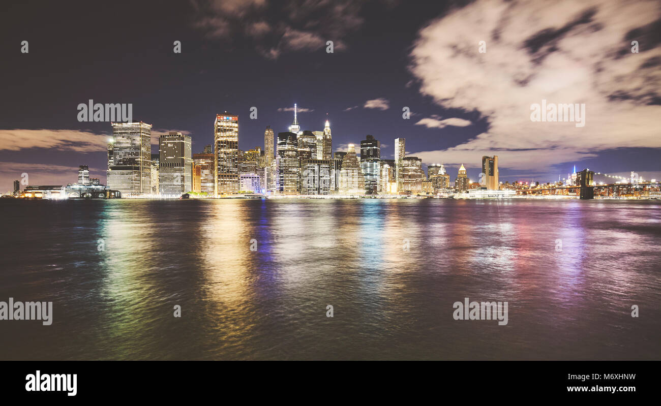 Wide angle picture of New York City skyline at night, color toned picture, USA. Stock Photo