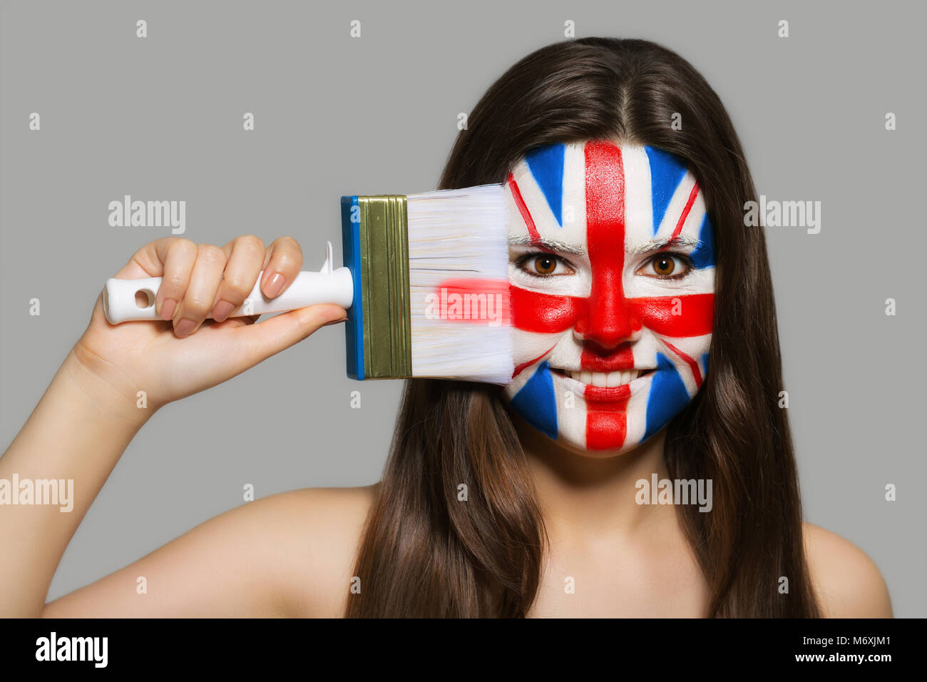 Female supporter in national colors of Great Britain Stock Photo