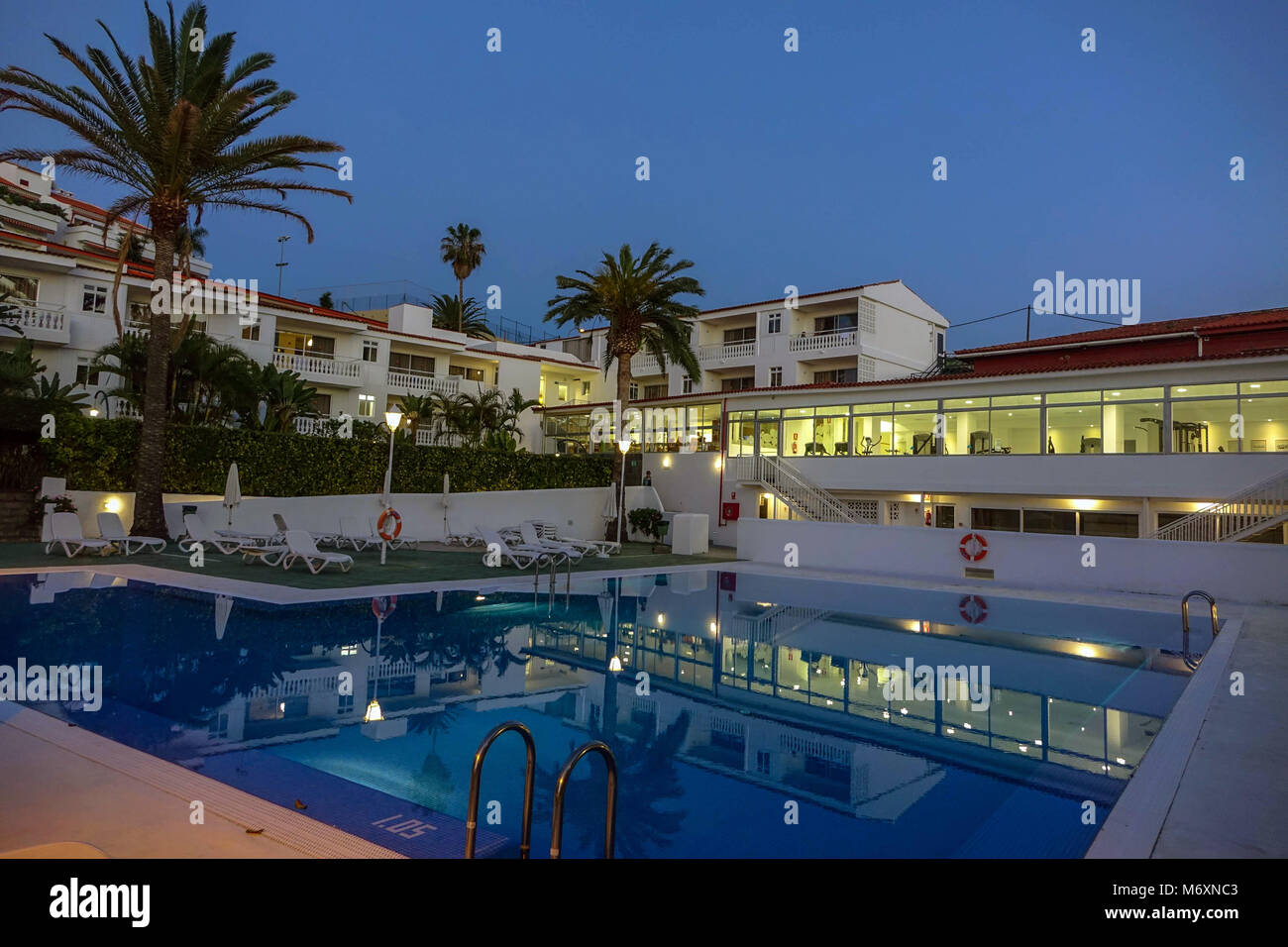 Route Active Hotel at dusk, at evening with swimming pool and reflections, Realejos, North Tenerife Stock Photo