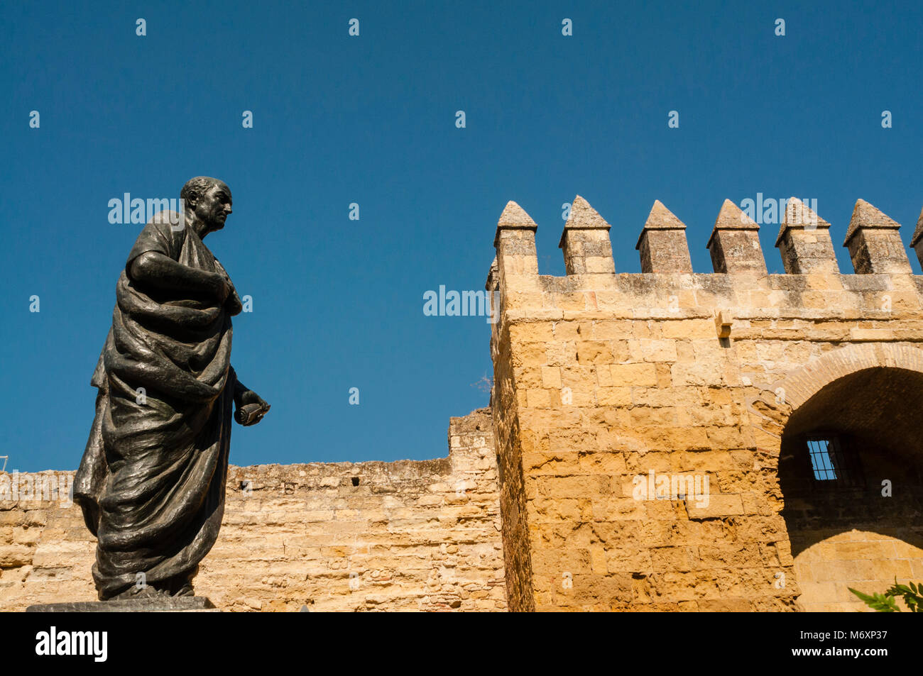 Statue of the Roman philosopher Seneca, Estatua del filósofo romano Séneca, Almodóvar gate, Puerta de Almodóvar, Córdoba, Andalucia, Spain Stock Photo