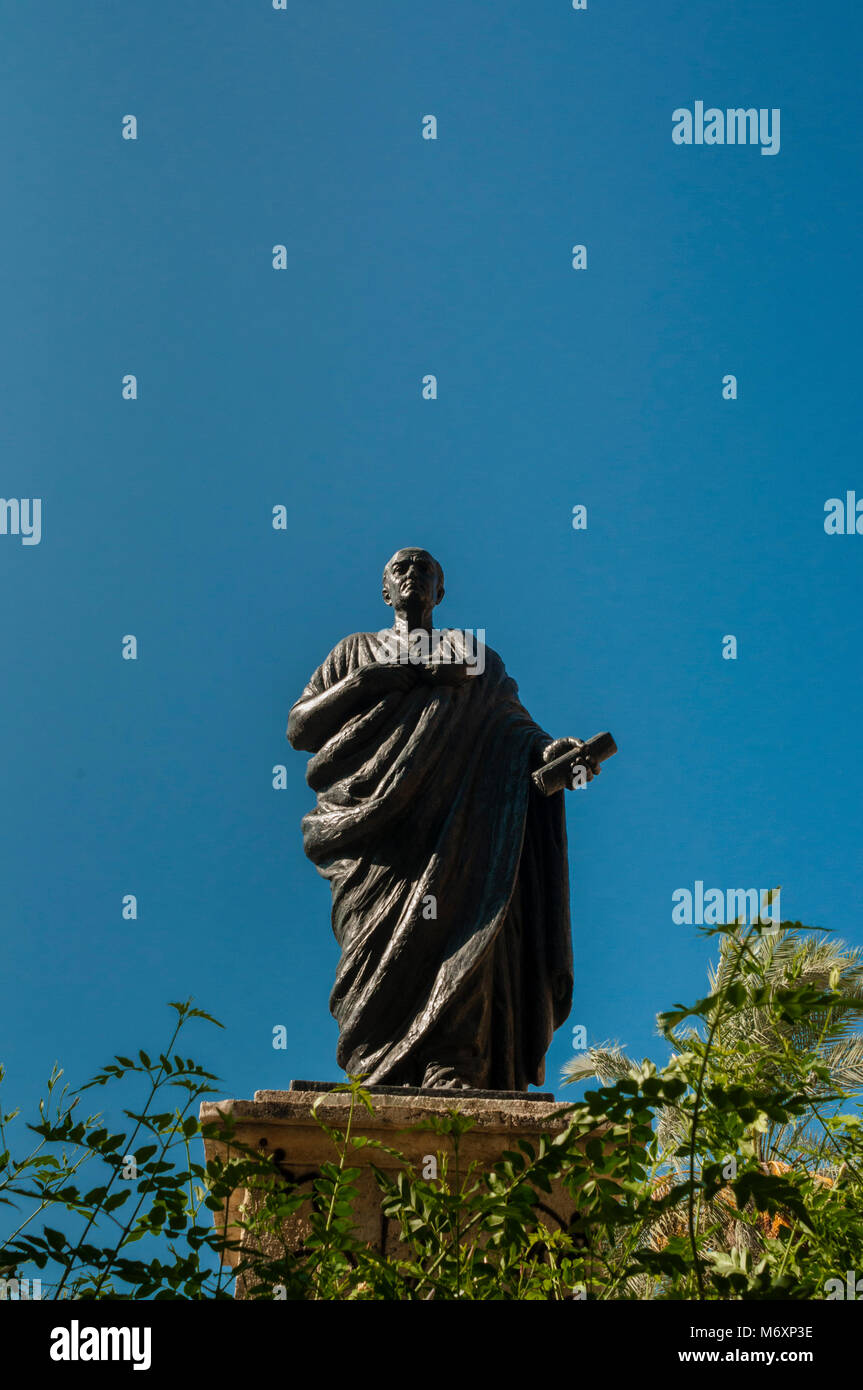 Statue of the Roman philosopher Seneca, Estatua del filósofo romano Séneca, Almodóvar gate, Puerta de Almodóvar, Córdoba, Andalucia, Spain Stock Photo