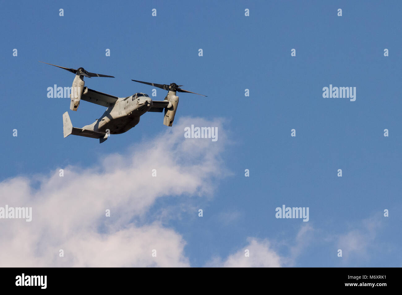 Bell Boeing V-22 Osprey tilt-rotor aircraft, operated by the US Marine Corps, flying in Kanagawa, Japan. Stock Photo