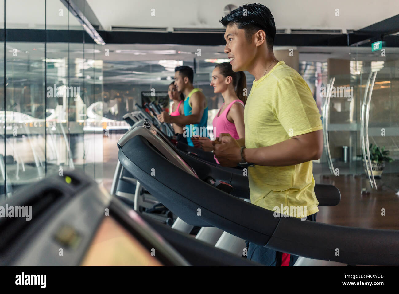 Beautiful woman drinking water during cardio training Stock Photo Alamy