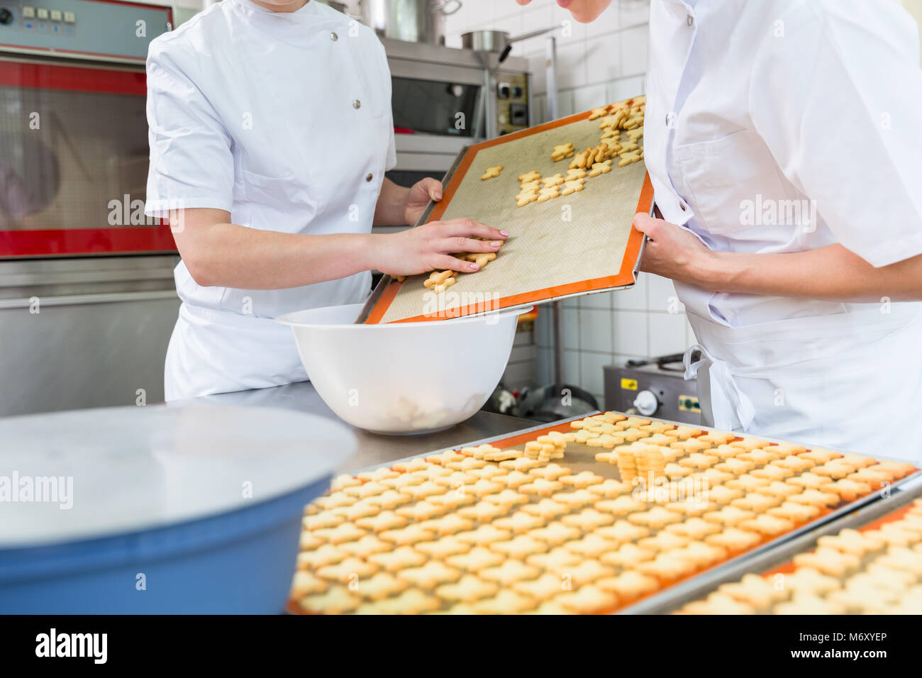 Cookies being baked in pastry bakery Stock Photo Alamy