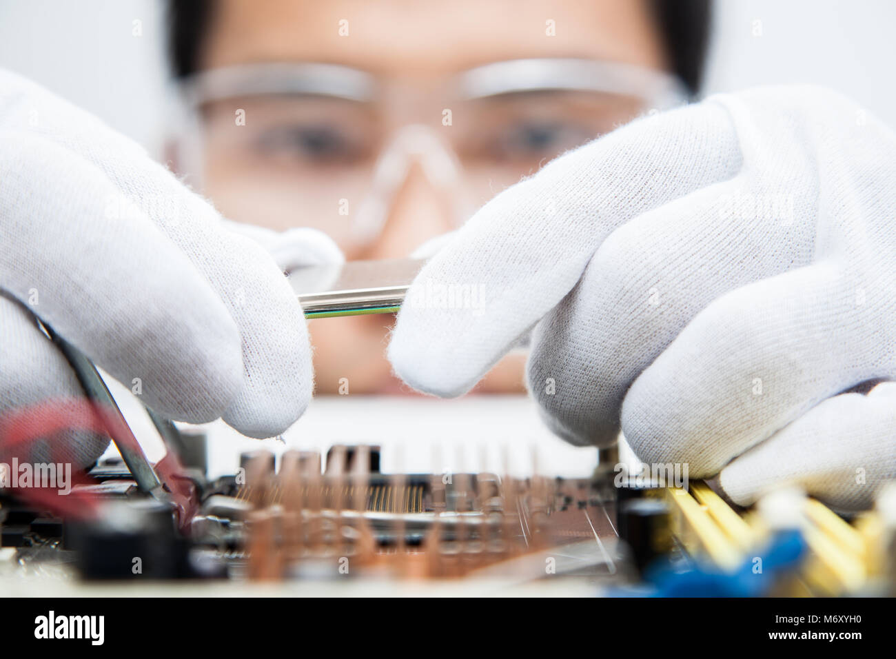 Expert engineers examining computer equipment Stock Photo Alamy