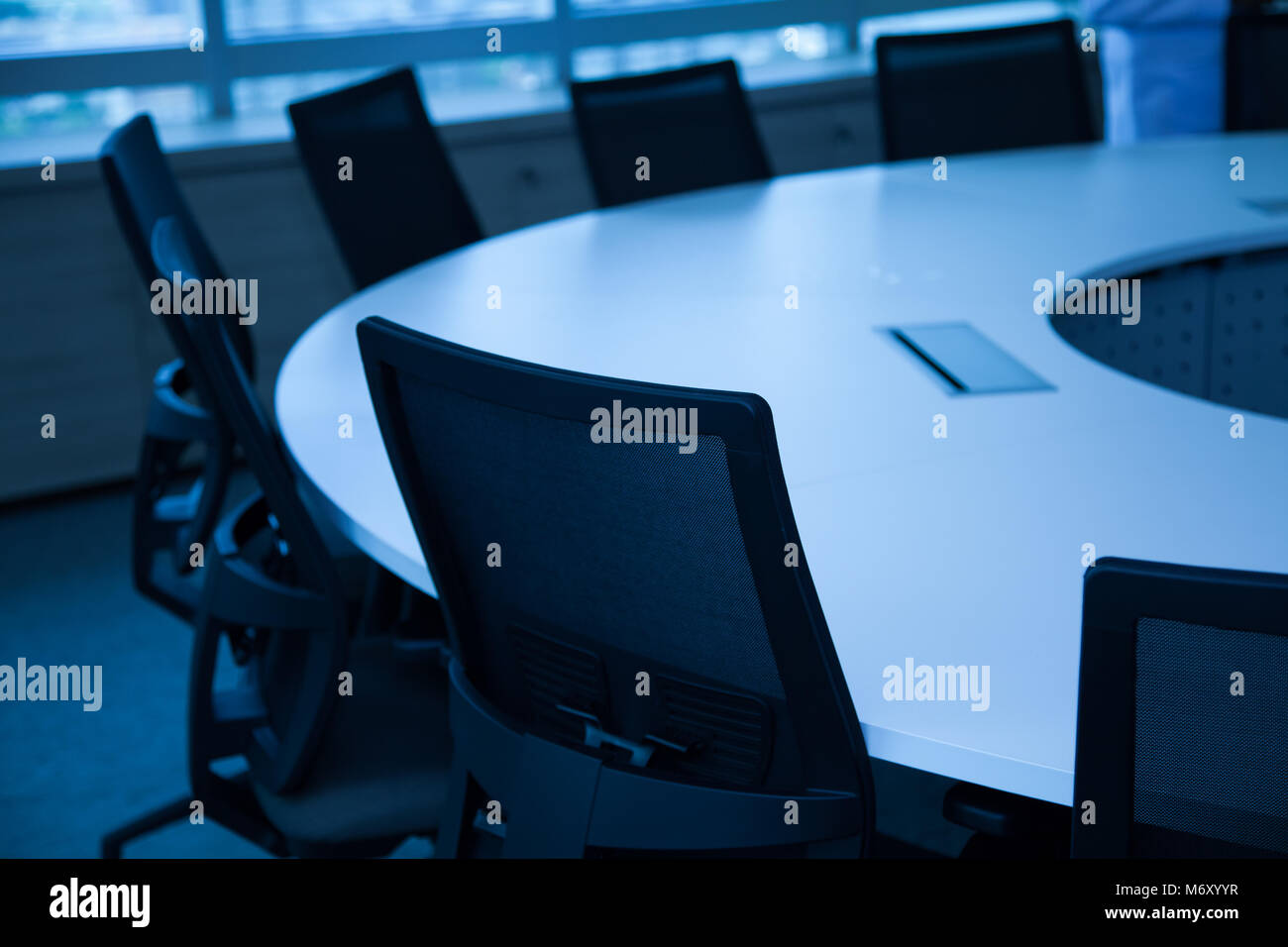 Table and chairs in meeting room. Stock Photo