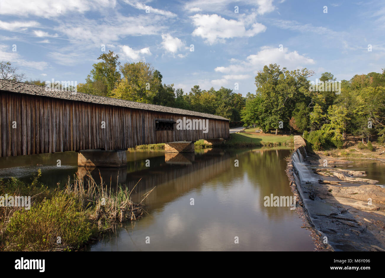 Watson Mill Bridge State Park is located outside Comer, Georgia.  It is the home of the longest covered brdige in the state, spanning over 200 feet across the South Fork River.  The park ecompasses over 1000 acres and has several amenitities including over-night camping. Stock Photo