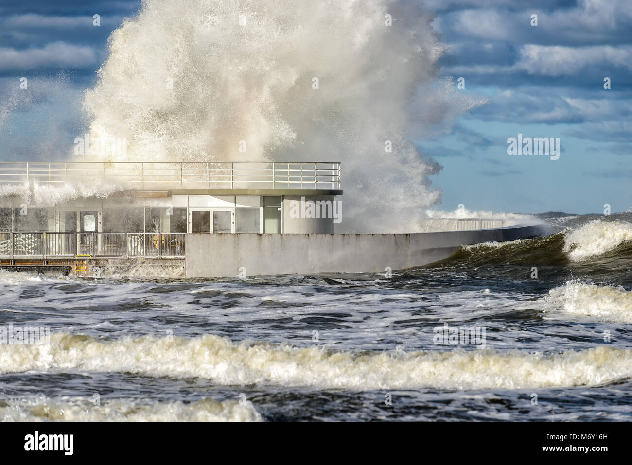 big braking waves during a gale in Kolobrzeg on the coast of the Baltic sea in Poland Stock Photo