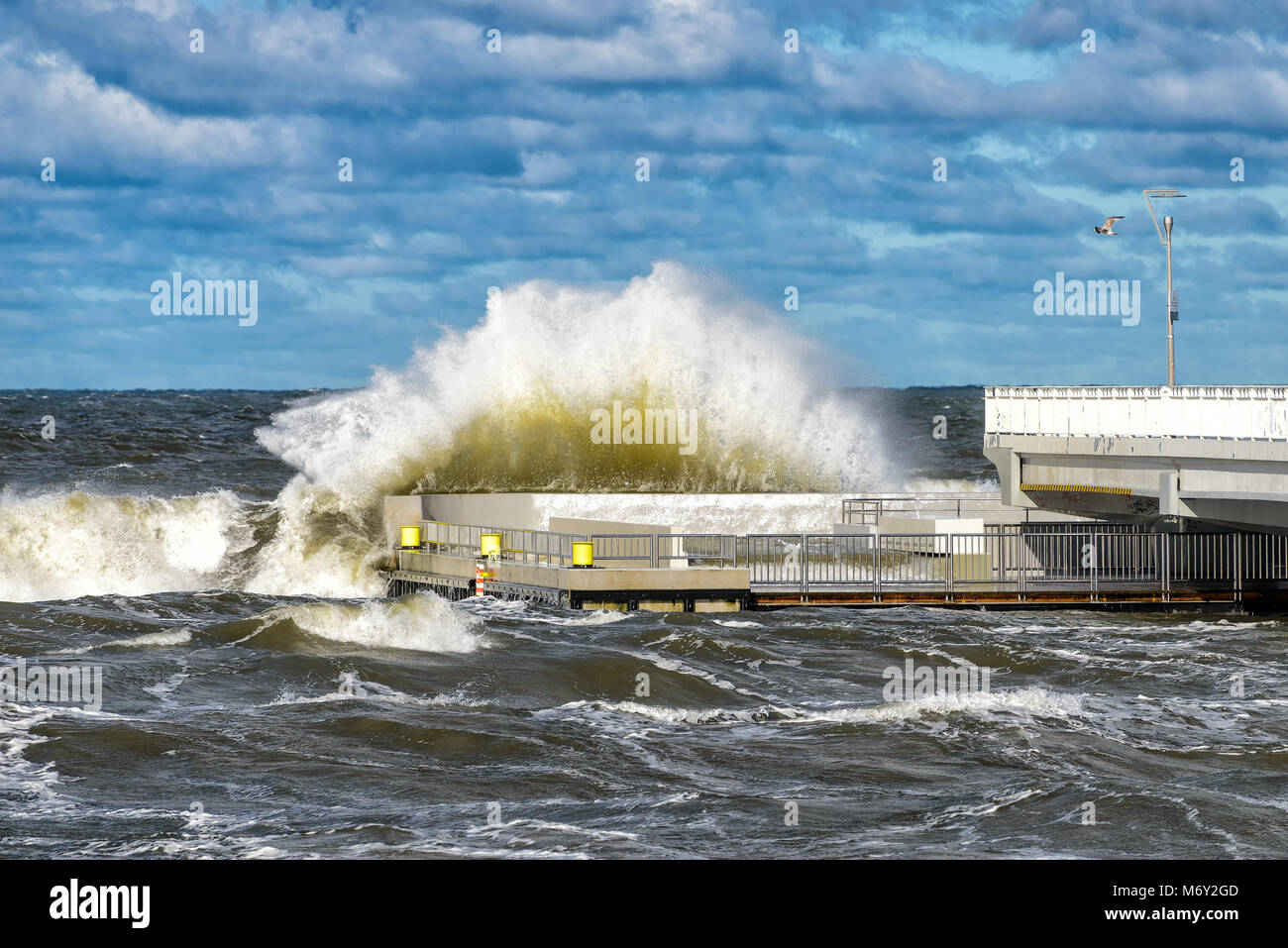 big braking waves during a gale in Kolobrzeg on the coast of the Baltic sea in Poland Stock Photo