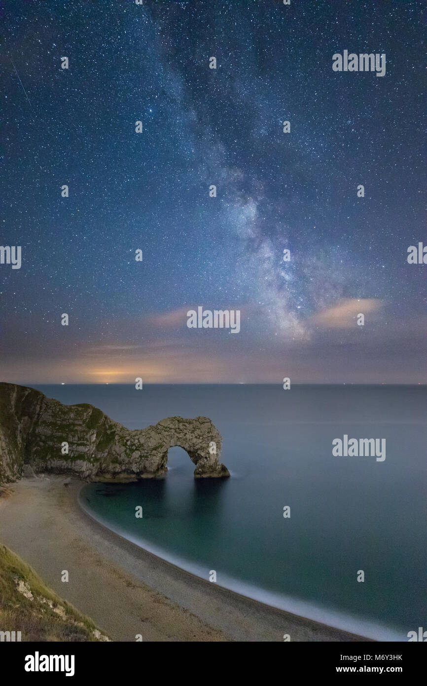 The Milky Way over Durdle Door, Jurassic Coast, Dorset, England, UK Stock Photo