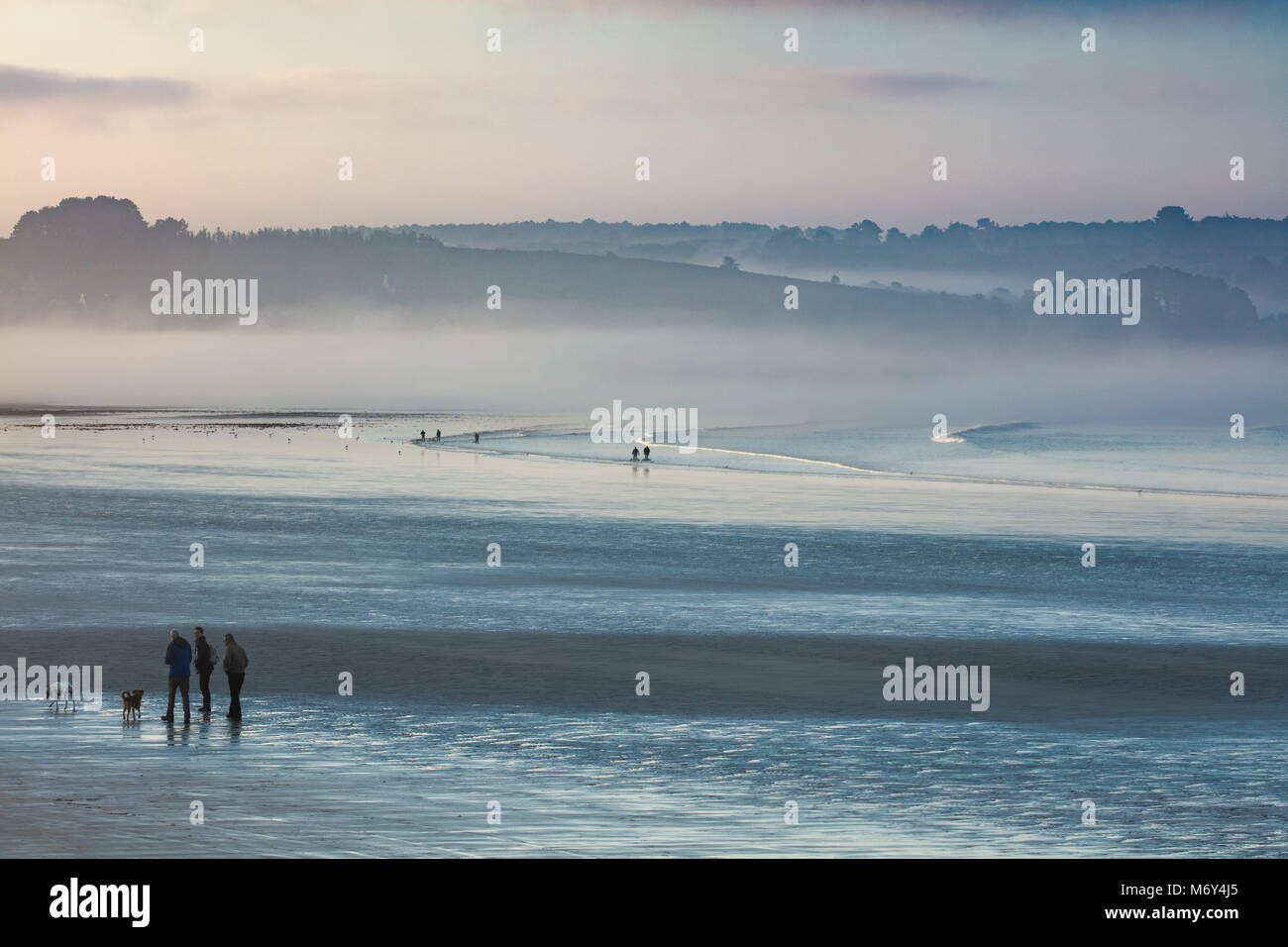 Sea Mist And Figures Walking Dogs On Plage De Kerloch