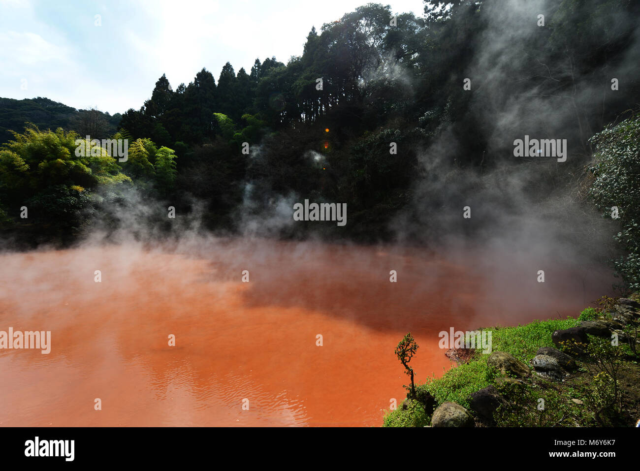 Chi-no-ike Jigoku ( Blood Pond) is the oldest Jigoku spring in Japan. Stock Photo