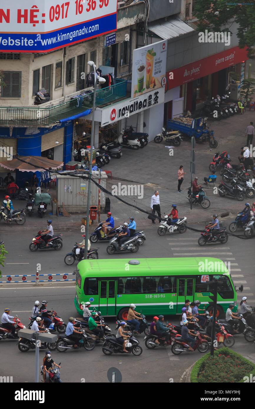 Crazy traffic at a crowded intersection in District 1 of Ho Chi Minh City,  Vietnam Stock Photo - Alamy, image size:866x1390