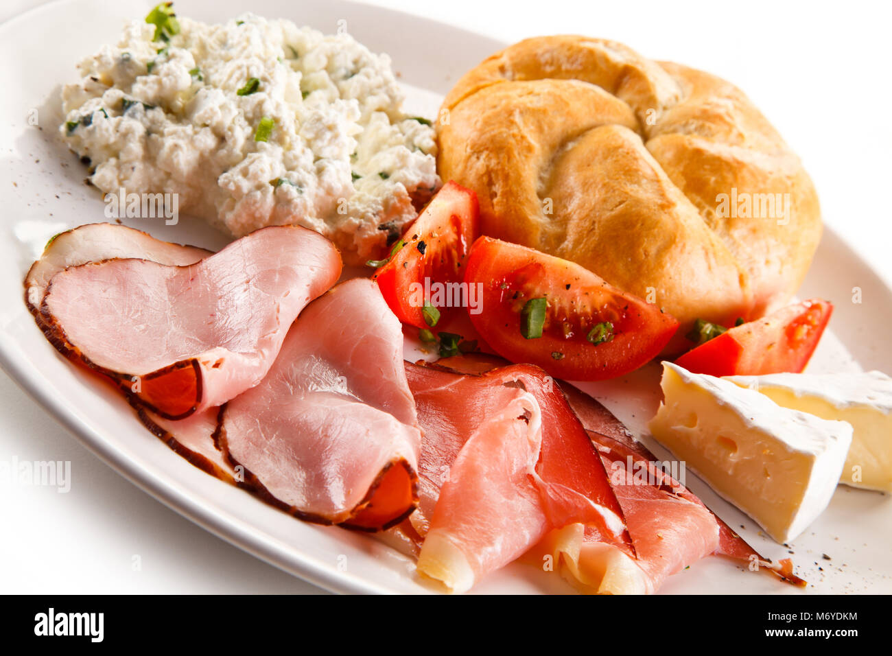 Breakfast - bacon, cottage cheese and vegetables Stock Photo