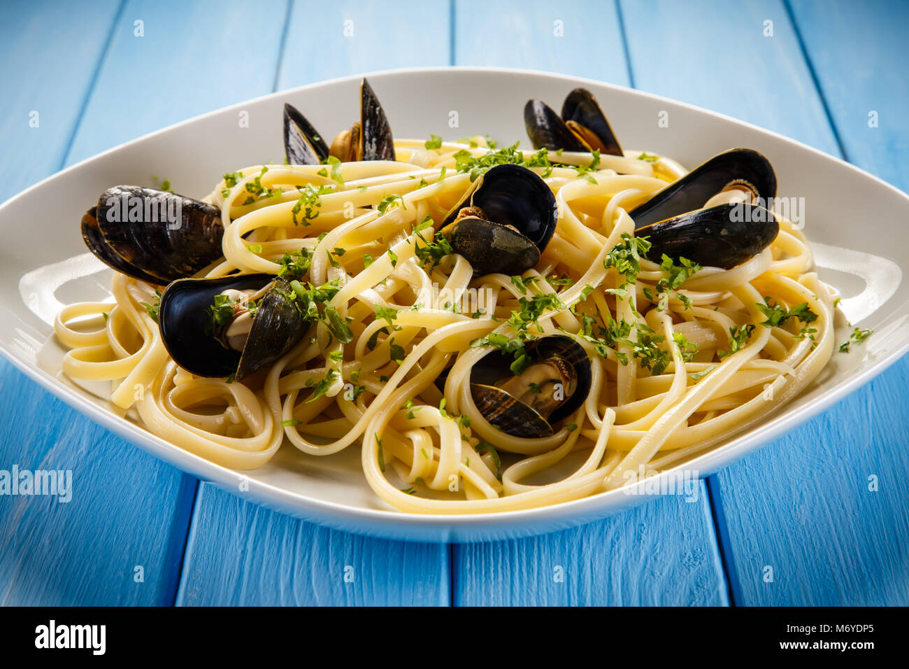 Cooked mussels and pasta Stock Photo Alamy