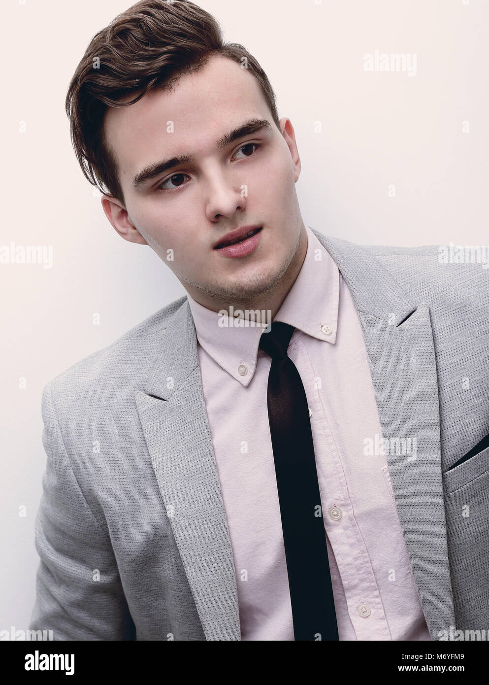 closeup of a young man in a business suit Stock Photo - Alamy
