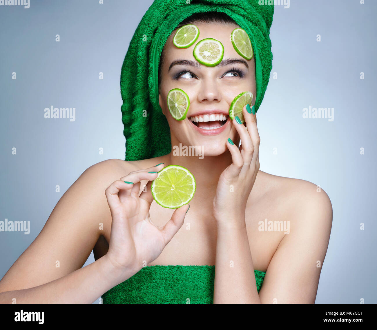 Girl holding towel hires stock photography and images Alamy