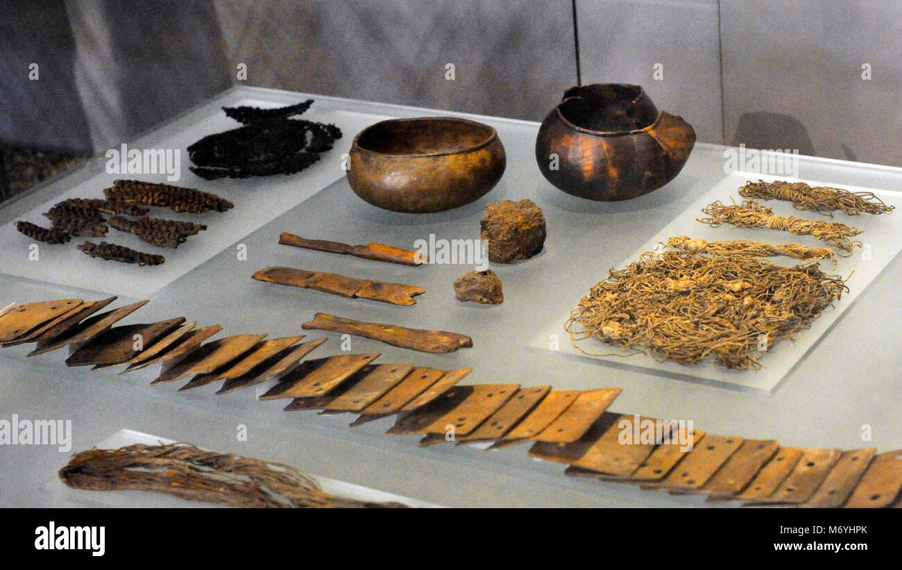 Group of tools used to weave. First, bone tablets. Found in the Tomb of