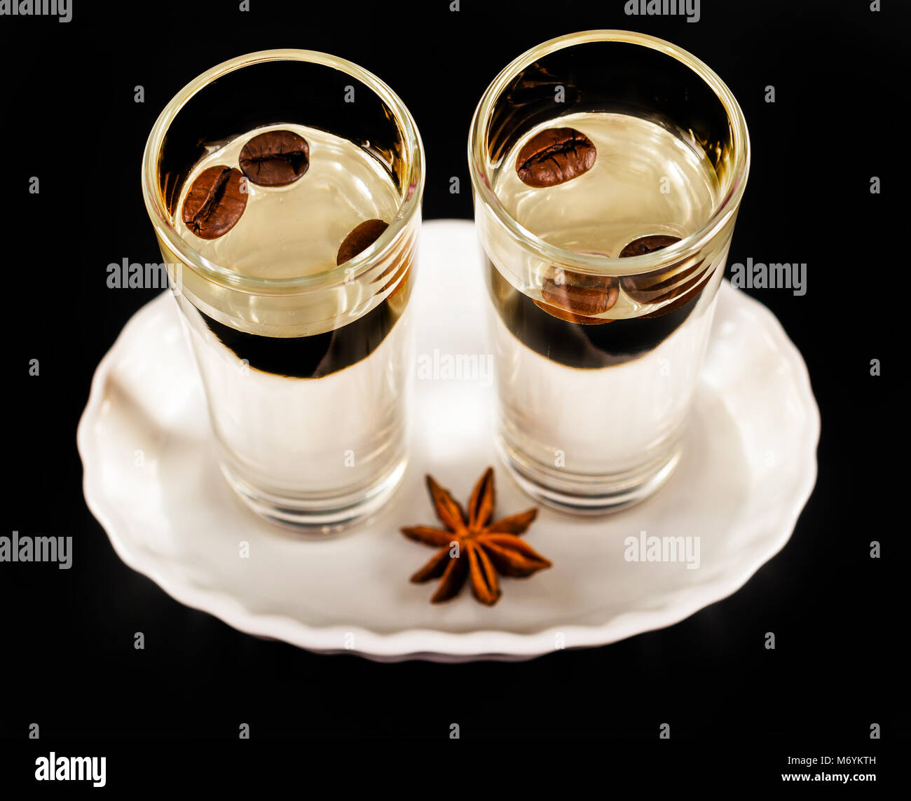 aromatic anise alcohol with coffee beans in a glass, drink set, party drink Stock Photo Alamy