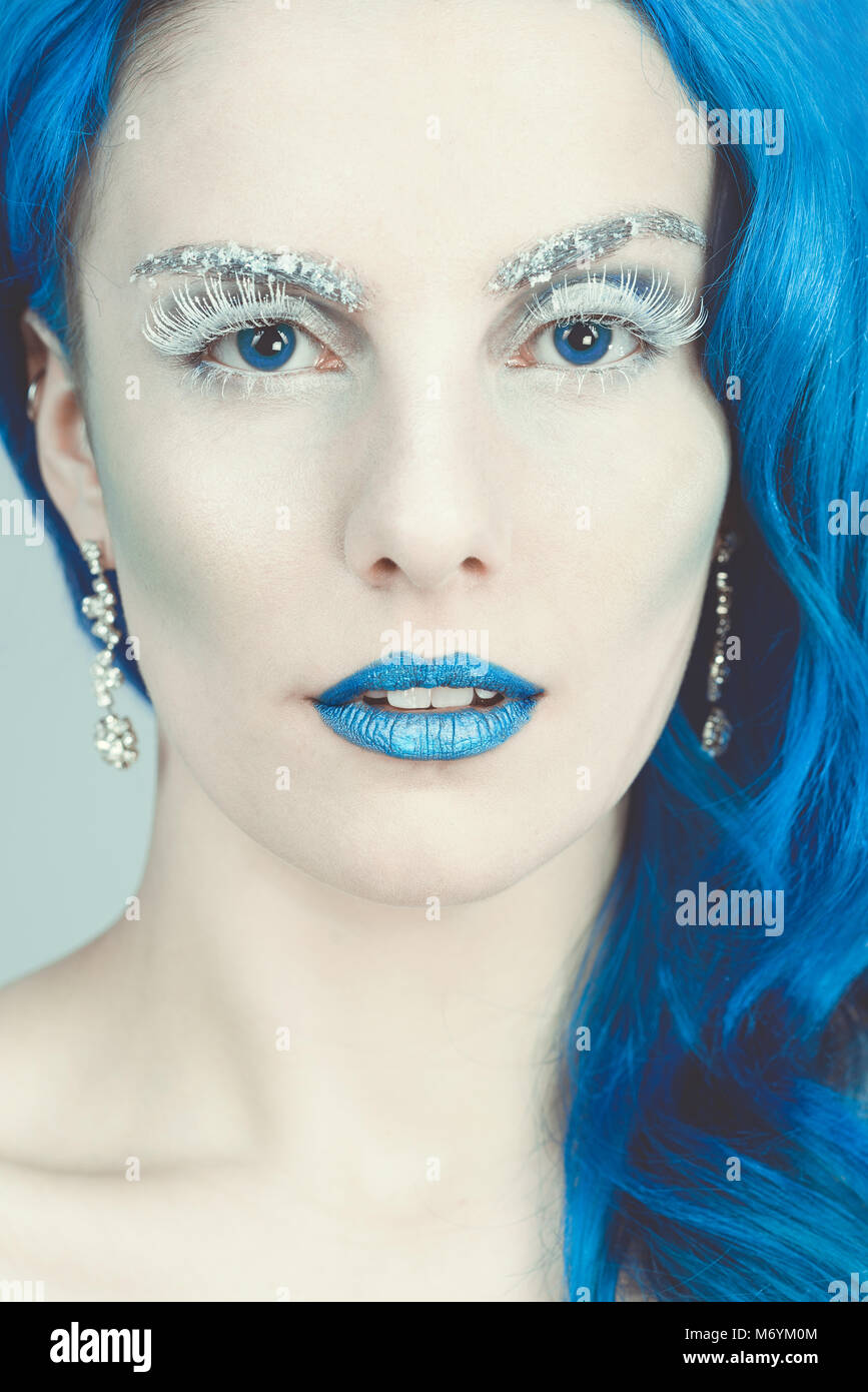 Snow queen concept with icy blue eyes and lips Stock Photo