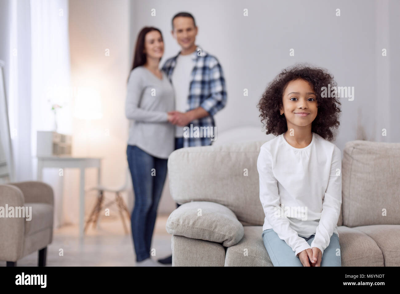 Preteen girl on sofa hi-res stock photography and images - Alamy