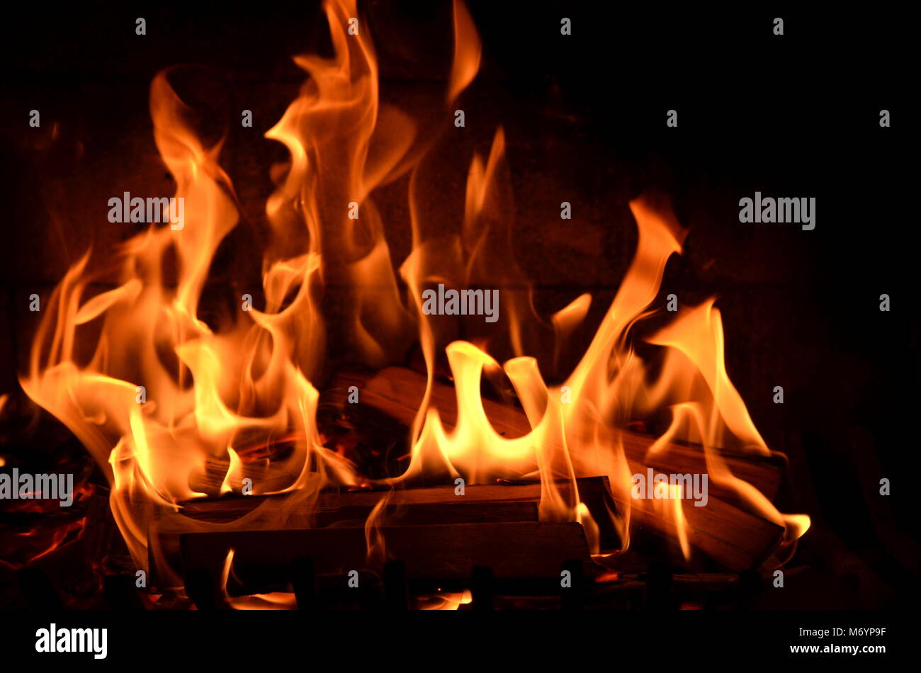 Close up of burning fire with blazing red, orange and yellow flames  background. Fire hazard, fire safety, arson, inferno, danger and house fire  theme Stock Photo - Alamy