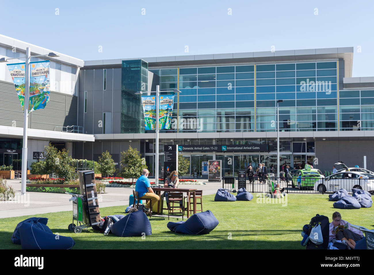 Lawn with bean bags and International Arrivals Terminal at Christchurch Airport, Harewood, Christchurch, Canterbury, New Zealand Stock Photo