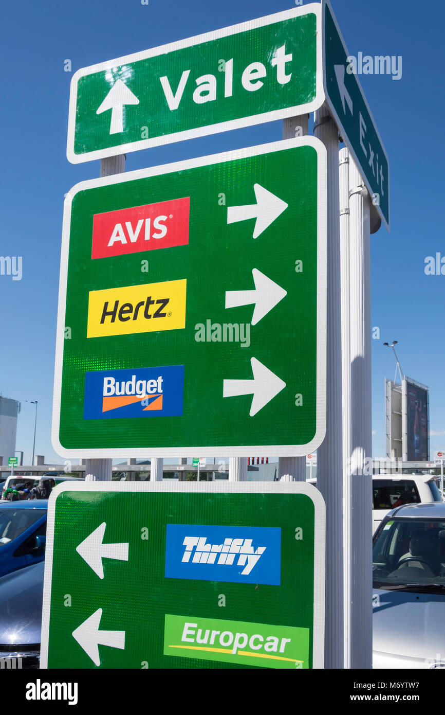 Hire car signs at Christchurch International Airport, Harewood, Christchurch, Canterbury, New Zealand Stock Photo
