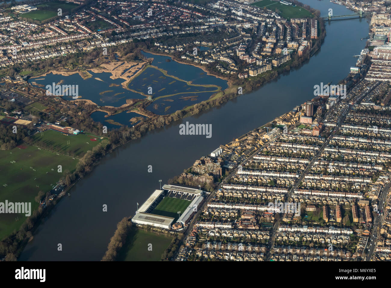 Aerial view of the Thames in West London looking west including Fulham football stadium and the London wetland centre Stock Photo