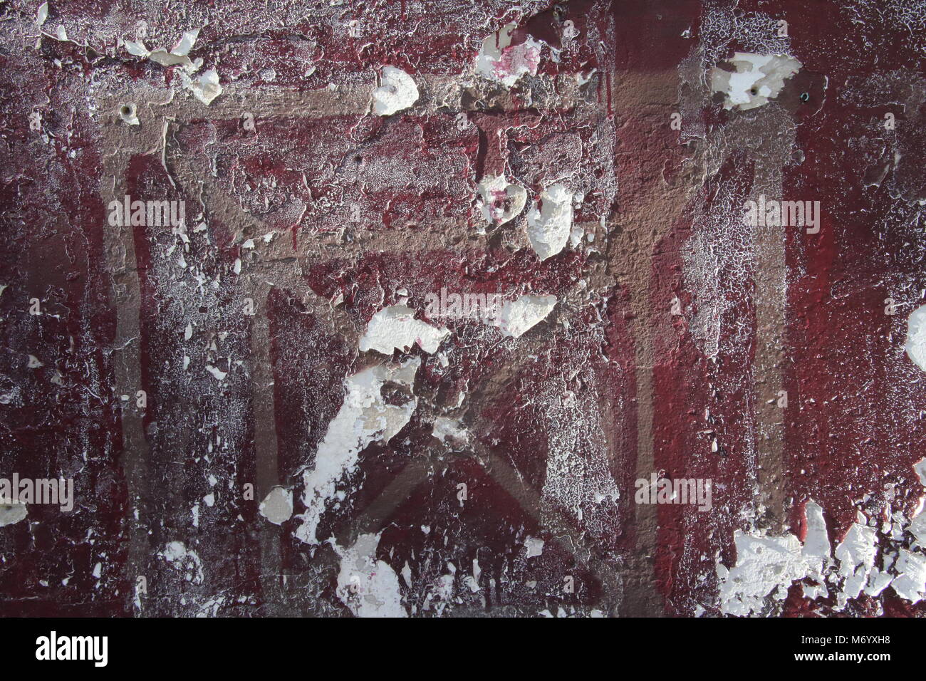 Flaking Sun damaged red paint Stock Photo Alamy