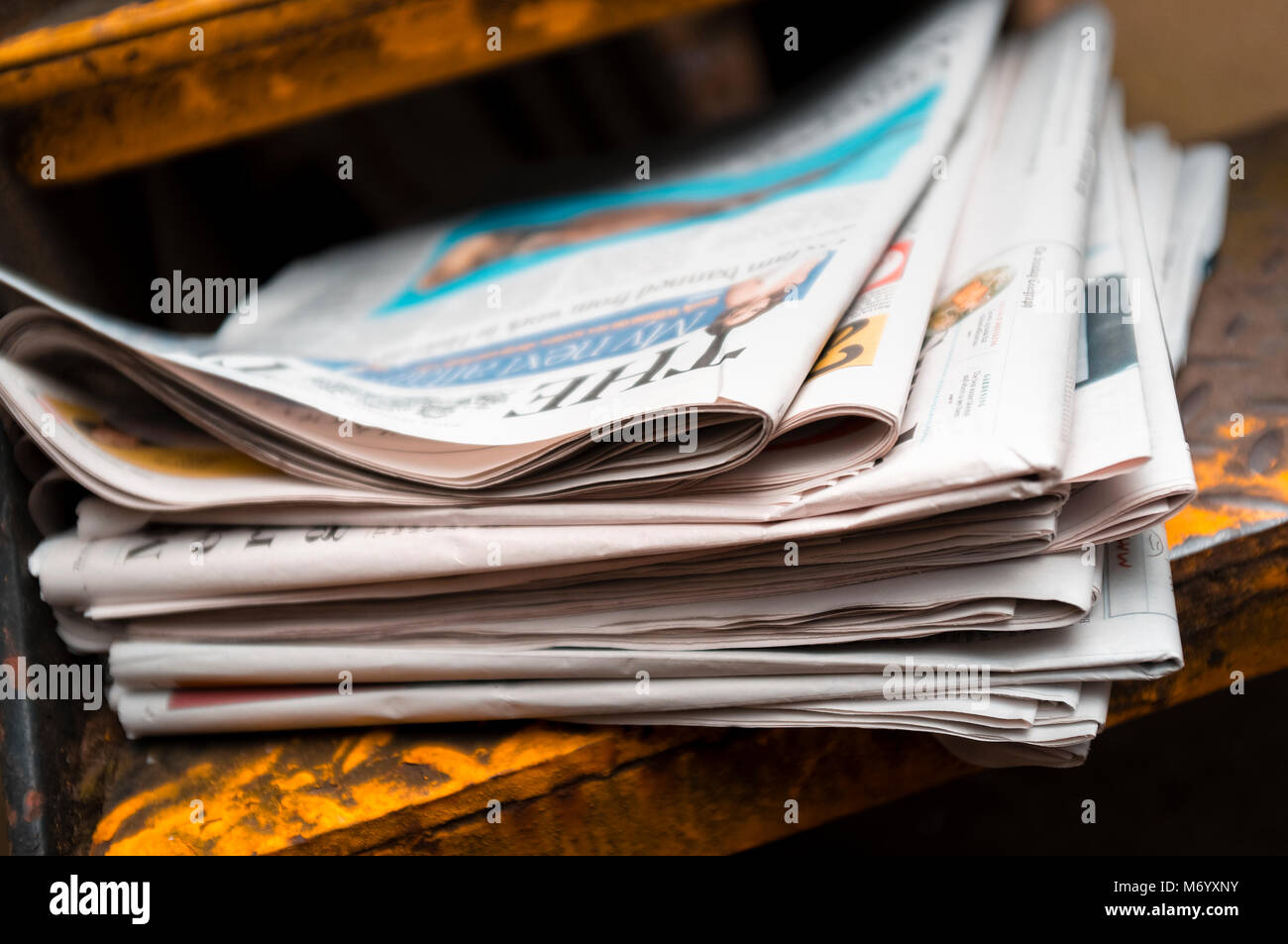 Pile of Newspapers from the United Kingdom Stock Photo