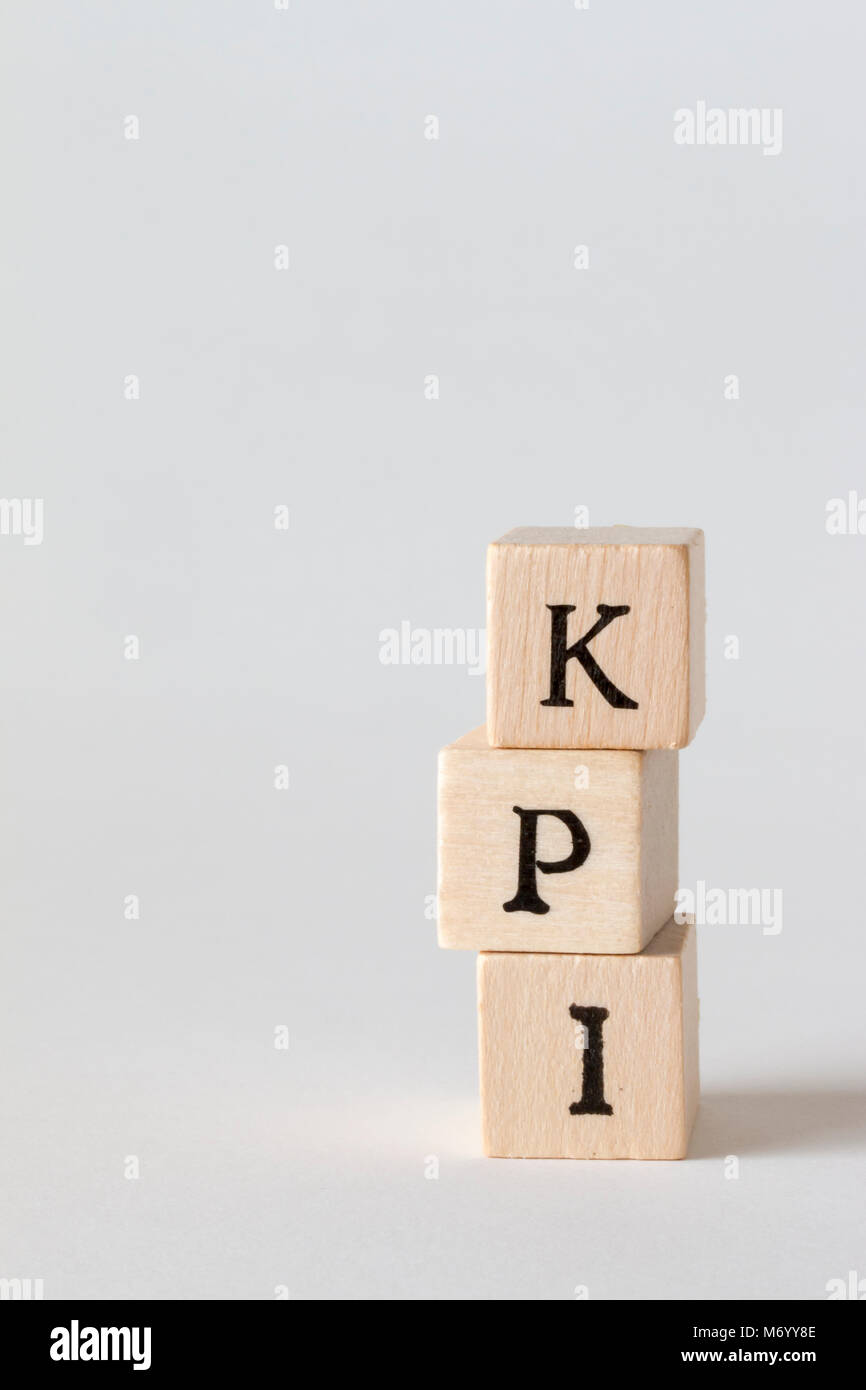 KPI Word Written In Wooden Blocks,Key Performance Indicator Stock Photo