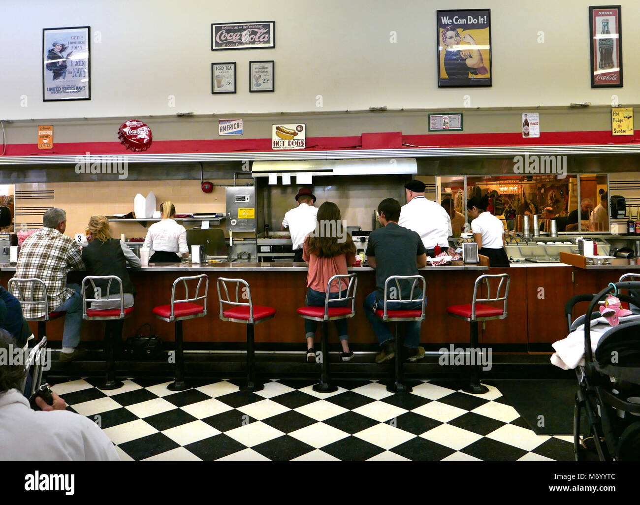 A 74 foot lunch counter at an F W Woolworth opened in 1950.  The store closed in  January 1994.   It reopened as a working lunch counter in December 1 Stock Photo