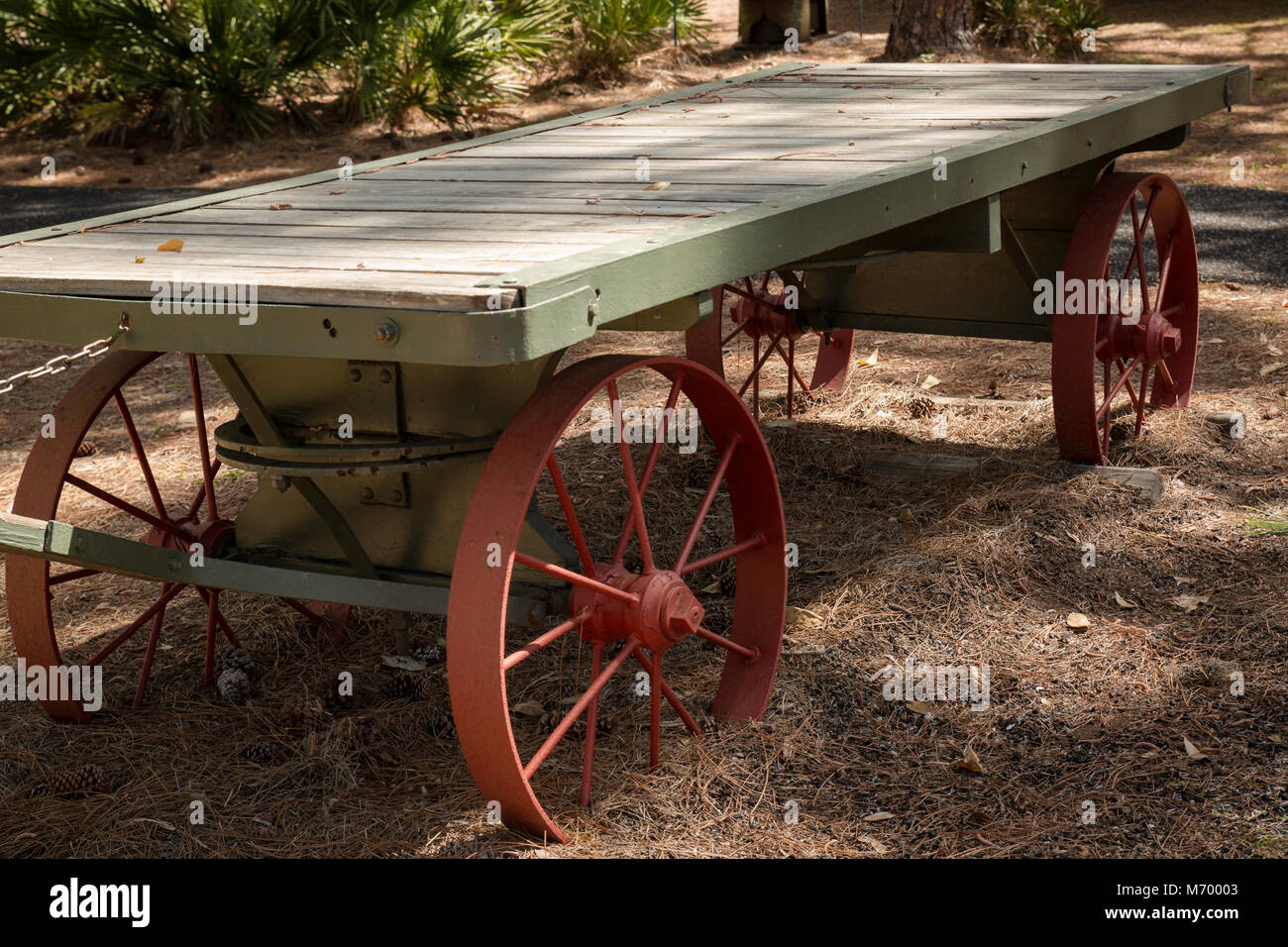 Antique flatbed trailer on metal wheel rims, Sawgrass Lake Park, Florida Stock Photo