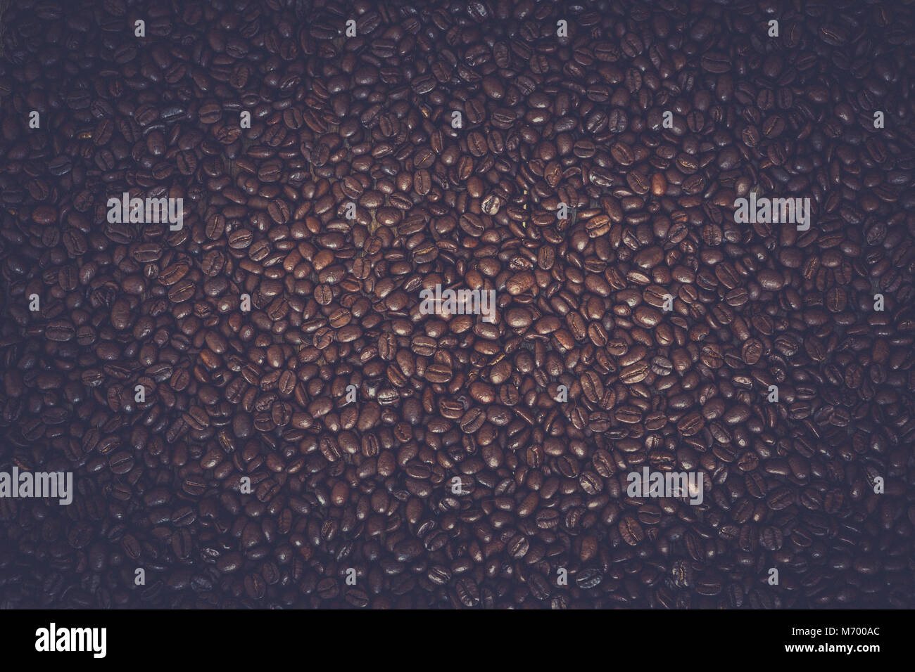 Rich brown roasted coffee beans background Stock Photo - Alamy