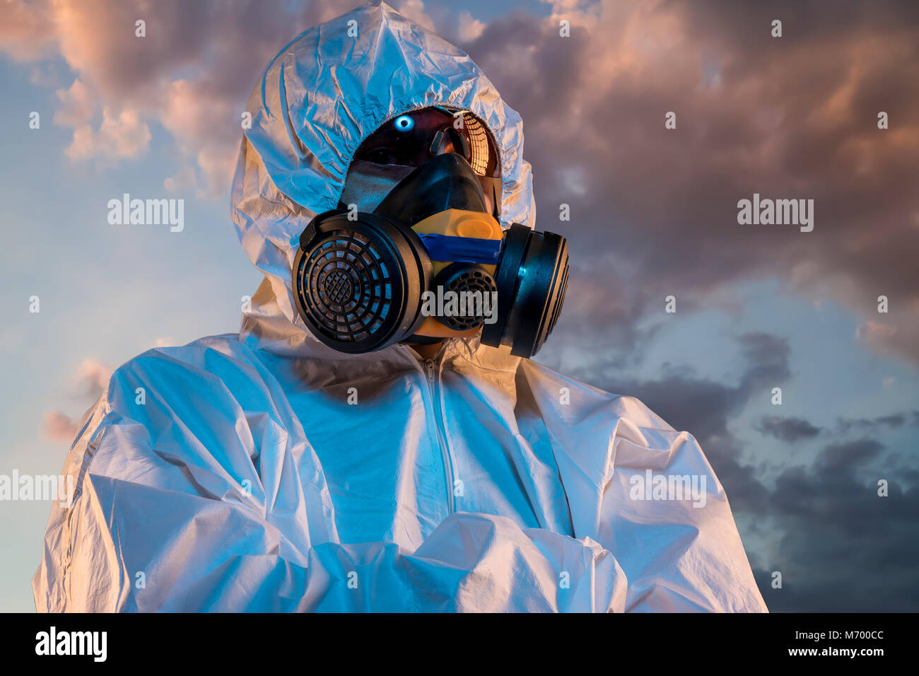 air contaminated by pollution, man with mask and protective suit