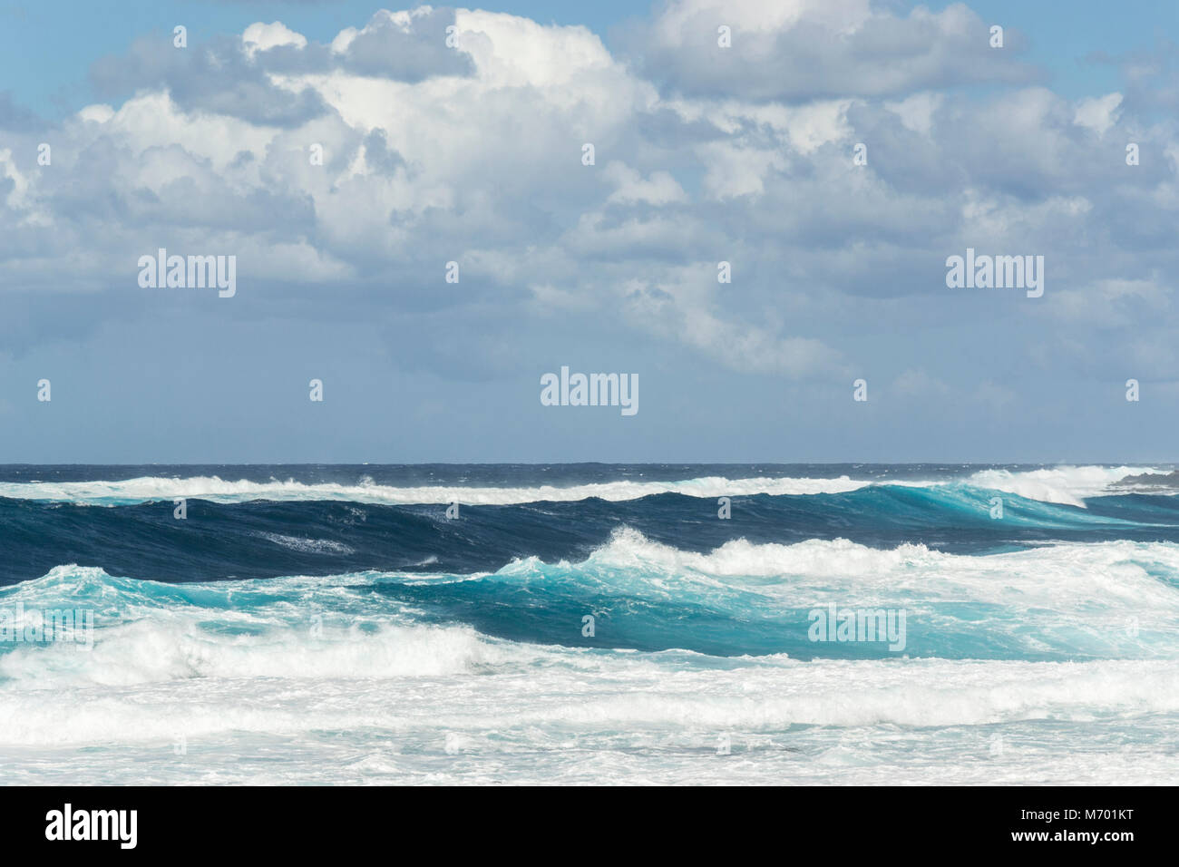 Rough turquoise sea with big waves and surf at La Santa, Lanzarote, Canary Islands, Spain Stock Photo