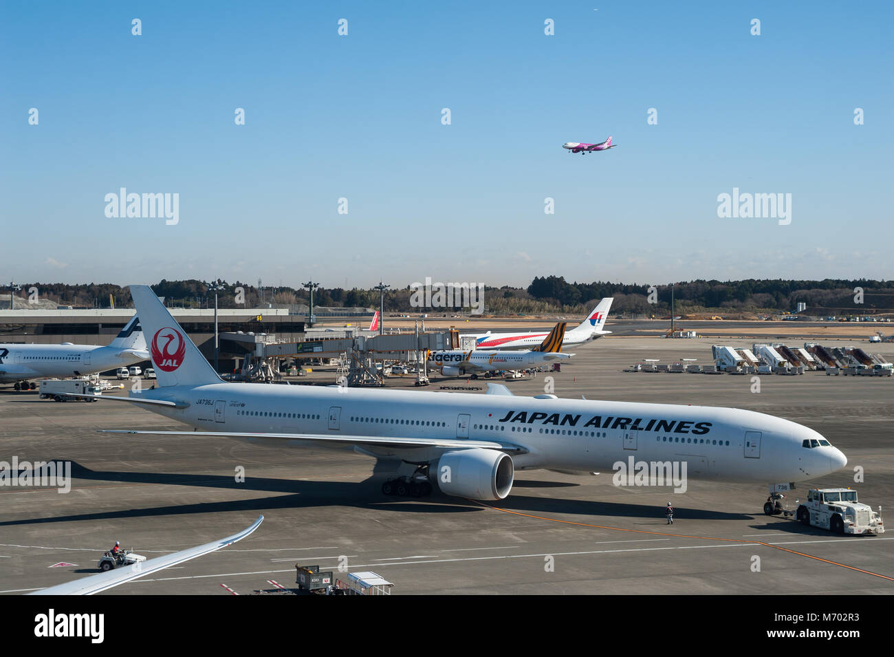 03.01.2018, Tokyo, Japan, Asia - A Japan Airlines passenger plane is seen at Tokyo's International Airport Narita. Stock Photo